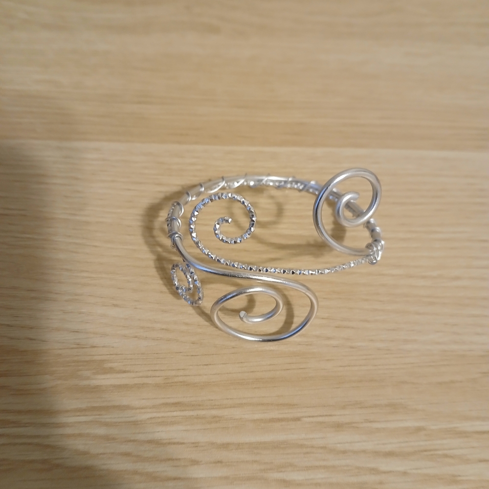 Elegant Silver Swirl Bracelet